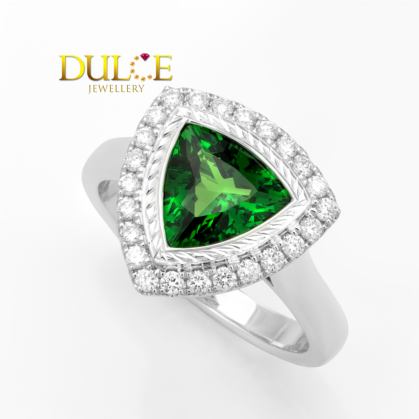 18k ring with a green tsavorite gemstone and diamond accents on a white background, featuring the Dulce Jewellery logo.