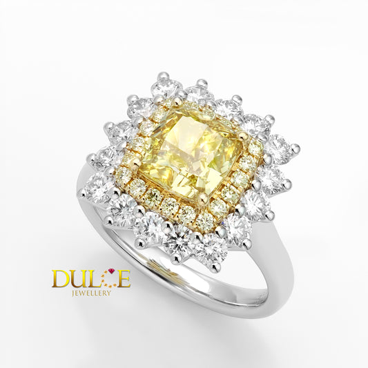 Diamond ring with a yellow center stone and white diamonds on a white background, featuring the brand 'Dulce Jewellery'.
