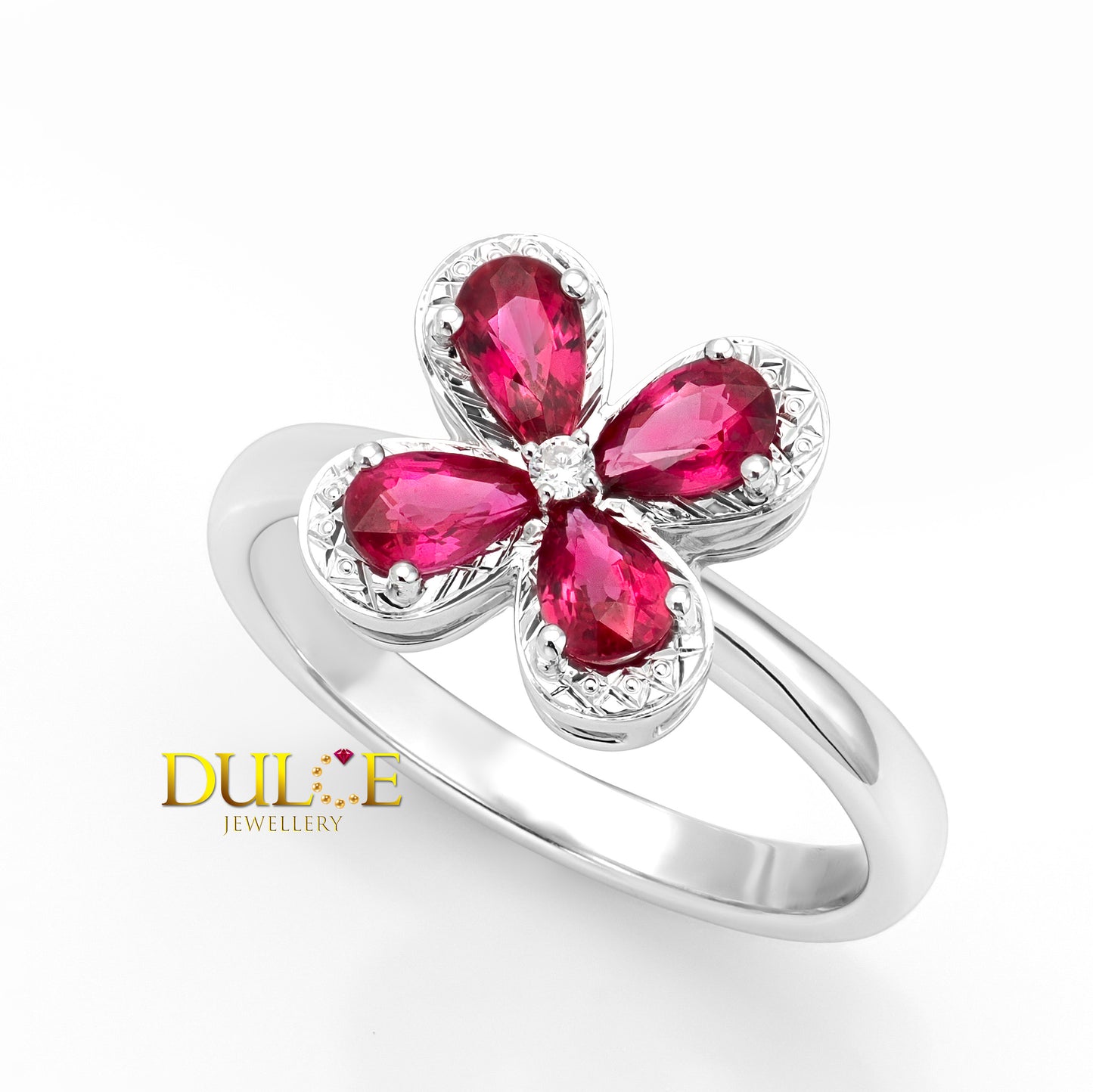 Gold ring with Ruby on a white background, branded as Dulce Jewellery.