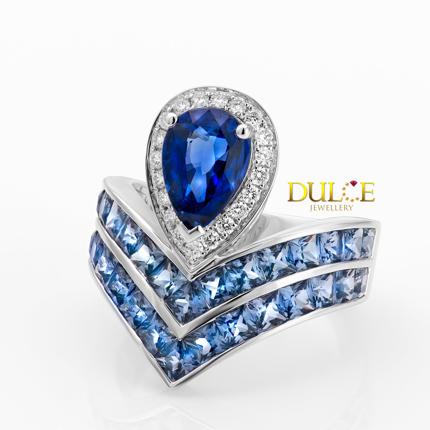 Elegant ring with blue gemstone and 'Dulce Jewellery' branding on a white background